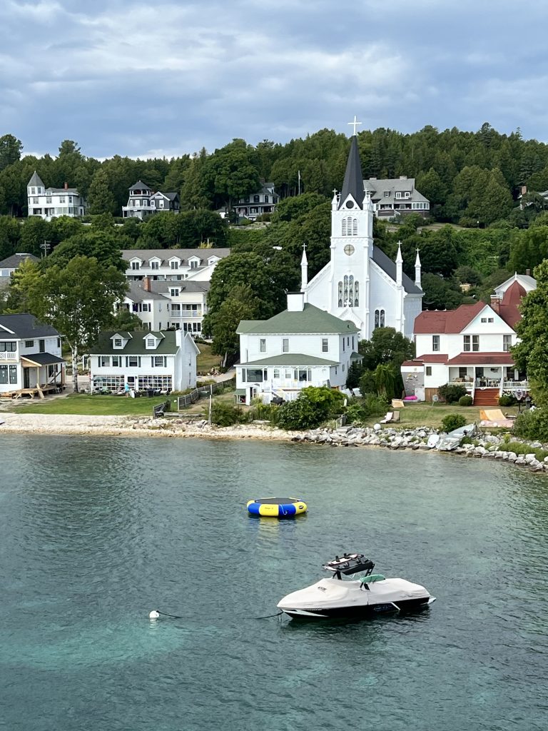 St. Anne's Catholic Church and surrounding buildings from above the water south east of the building